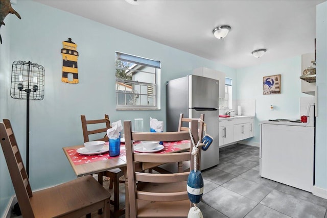 dining room featuring sink