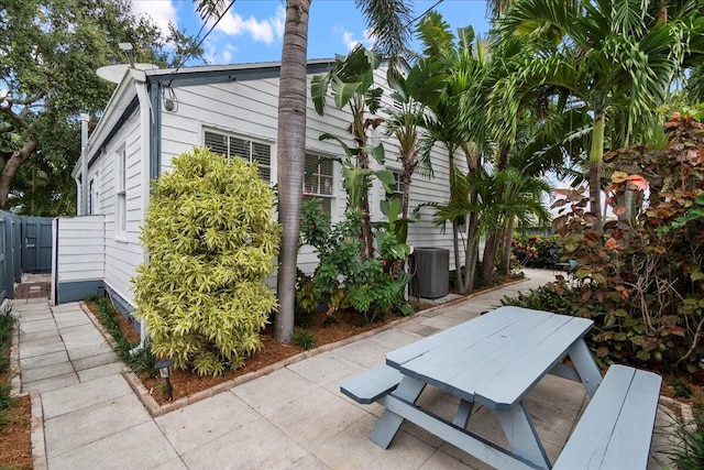 502 39th St, West Palm Beach, FL 33407 - view of patio / terrace with central air condition unit and fence