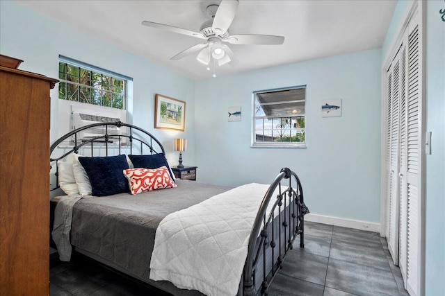 502 39th St, West Palm Beach, FL 33407 - bedroom with a closet, baseboards, and ceiling fan