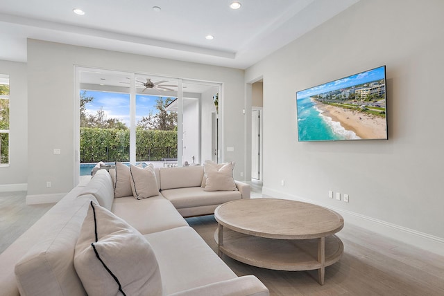 living room with a healthy amount of sunlight and light wood-type flooring