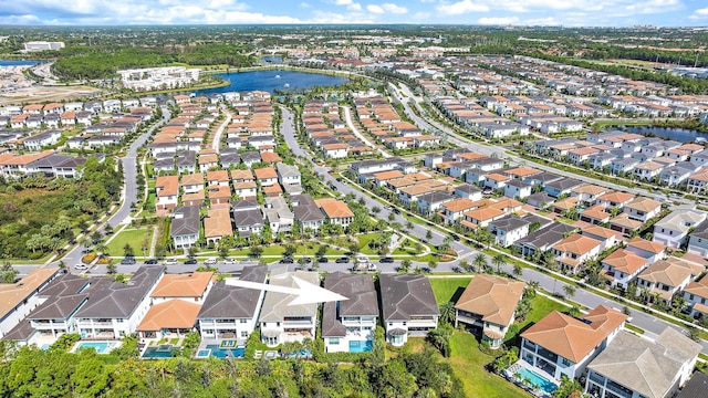 birds eye view of property featuring a water view