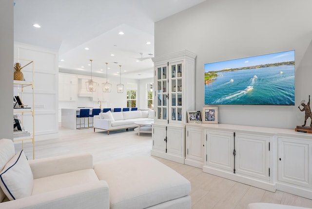 living room with light hardwood / wood-style floors