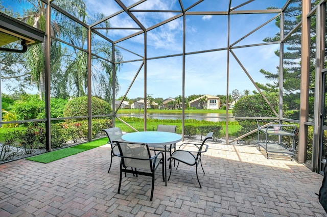 sunroom with a water view