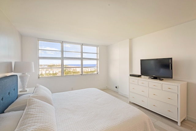 bedroom featuring light wood-type flooring