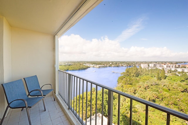 balcony featuring a water view