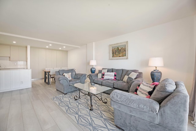 living room featuring recessed lighting and light wood-style flooring