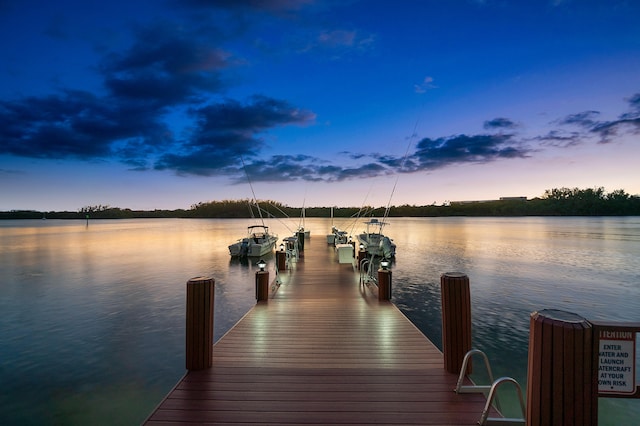 view of dock with a water view and boat lift