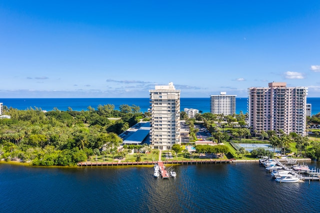 birds eye view of property featuring a water view