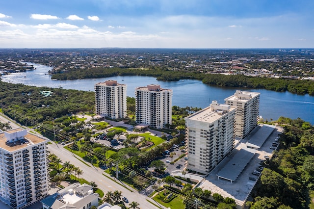 bird's eye view featuring a view of city and a water view