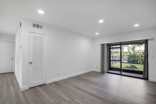 unfurnished room featuring light wood-type flooring