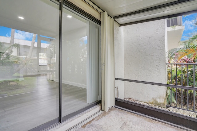 doorway to property with a balcony