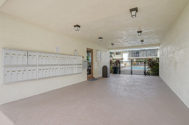 view of patio / terrace with a mail area