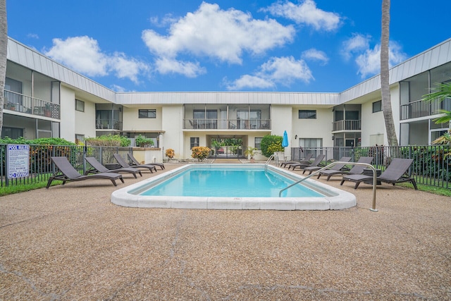 view of swimming pool featuring a patio