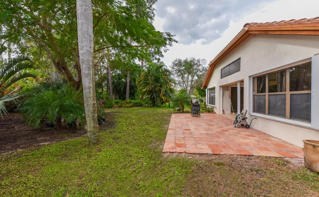 view of yard with a patio area