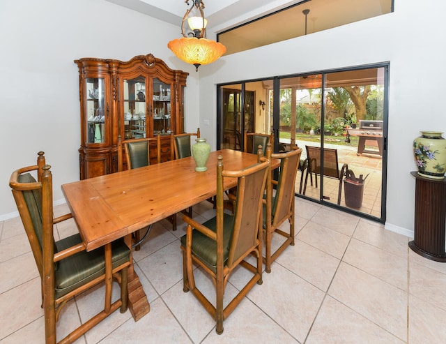 dining room featuring light tile patterned floors