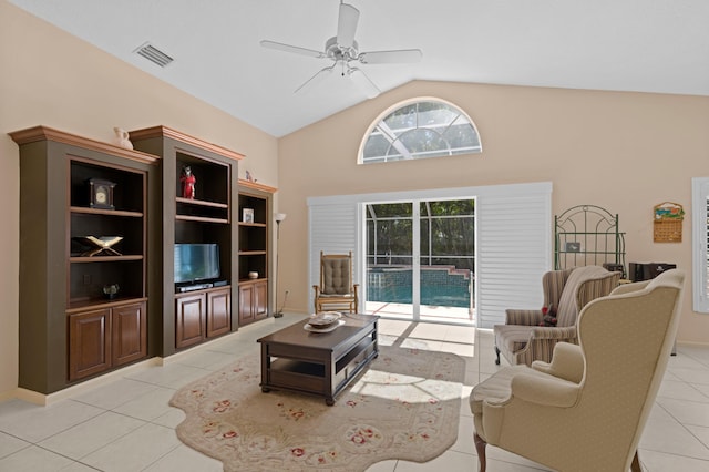 living room featuring ceiling fan, high vaulted ceiling, and light tile patterned floors