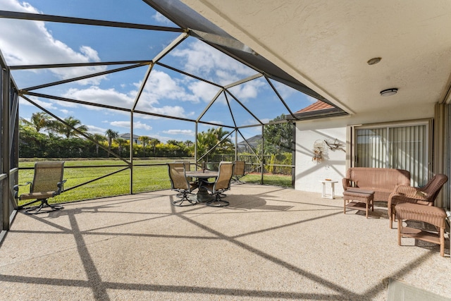 view of patio / terrace with glass enclosure