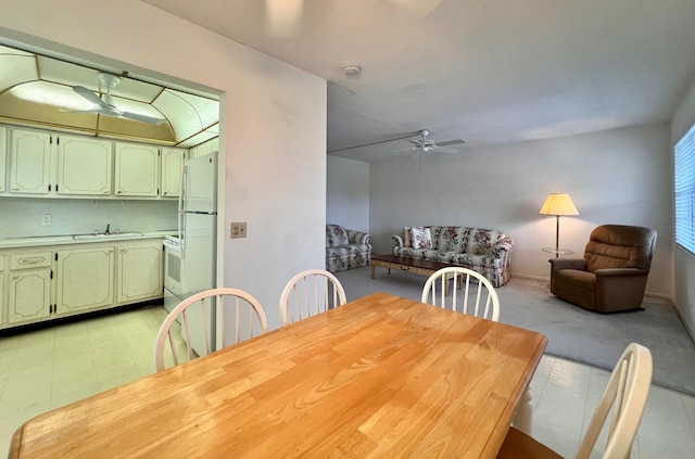 dining area with ceiling fan