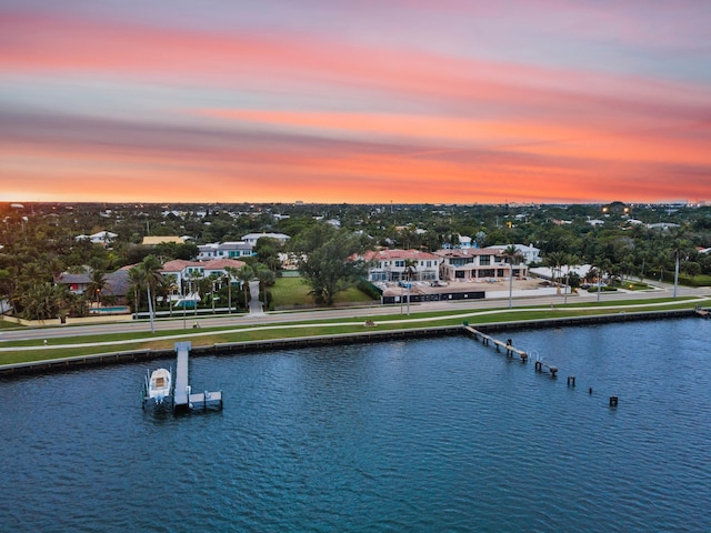 5400 Essex Ct, West Palm Beach, FL 33405 - aerial view at dusk featuring a water view