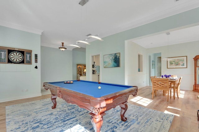 recreation room featuring ornamental molding, billiards, and light wood-type flooring