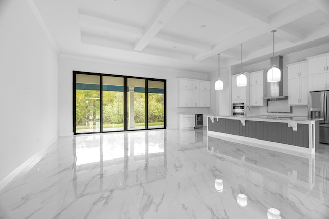 living room with ornamental molding, beam ceiling, sink, and coffered ceiling