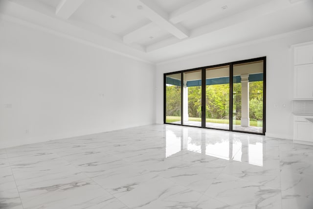 empty room with beamed ceiling, coffered ceiling, and ornamental molding