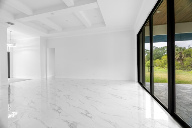 empty room featuring a wealth of natural light, beamed ceiling, ornamental molding, and floor to ceiling windows