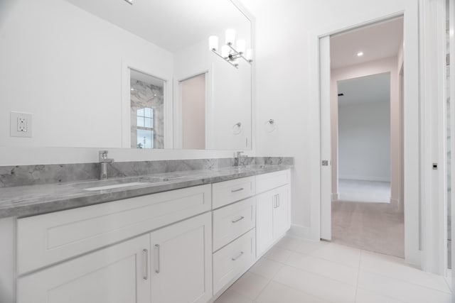 bathroom featuring vanity and tile patterned flooring