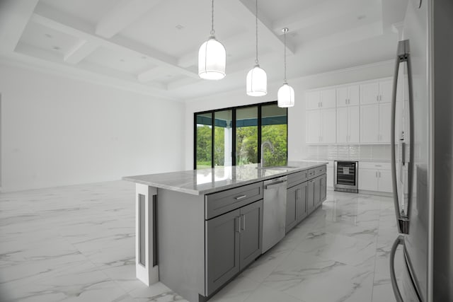 kitchen featuring beamed ceiling, white cabinetry, stainless steel appliances, and coffered ceiling