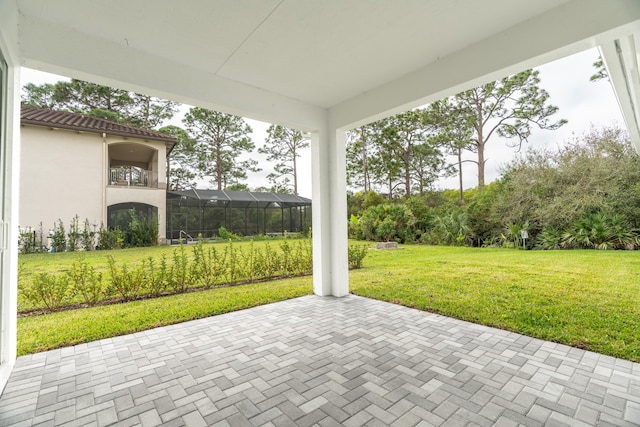 view of patio featuring a balcony