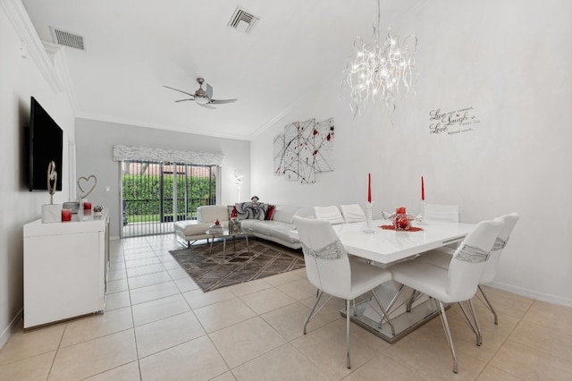 dining space featuring ceiling fan with notable chandelier, crown molding, and light tile patterned flooring