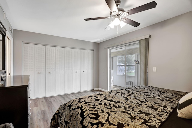 bedroom with a closet, ceiling fan, and light hardwood / wood-style flooring