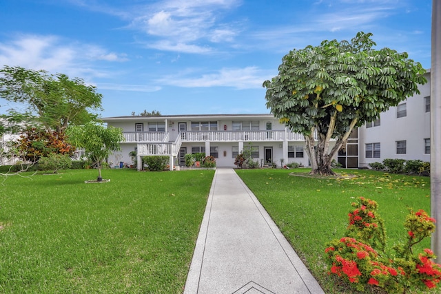 view of front of home with a front yard