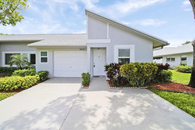 view of front of property with a garage