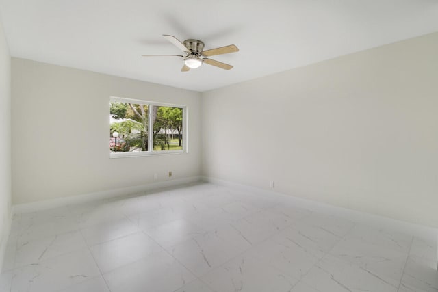 unfurnished room featuring ceiling fan