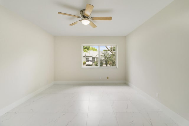 empty room featuring ceiling fan