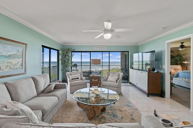 2571 NE Ocean Blvd Unit 10-203, Stuart, FL 34996 - living area featuring a ceiling fan, ornamental molding, and light tile patterned floors