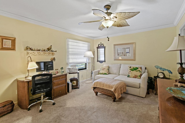 office with crown molding, light carpet, and ceiling fan