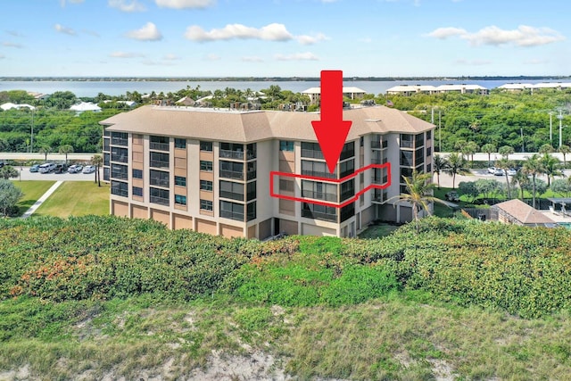 2571 NE Ocean Blvd Unit 10-203, Stuart, FL 34996 - view of apartment building / complex featuring a water view