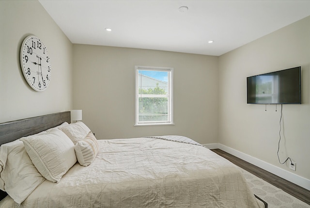 bedroom with wood-type flooring