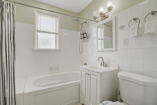 full bathroom with backsplash, vanity, shower / bath combo, toilet, and tile walls