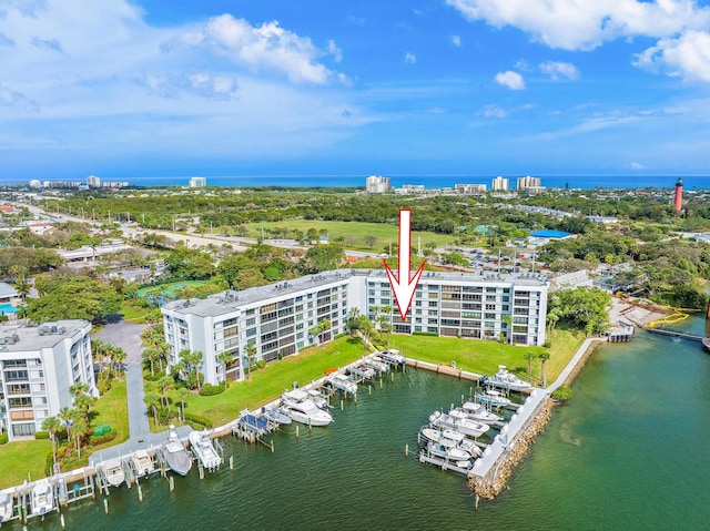 drone / aerial view with a water view