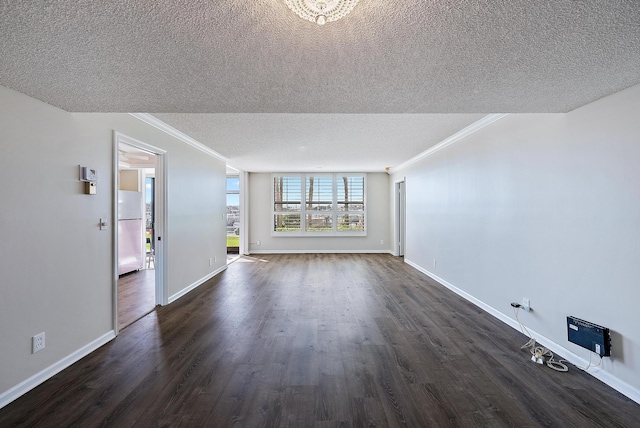 unfurnished room with dark wood-type flooring, a textured ceiling, and ornamental molding