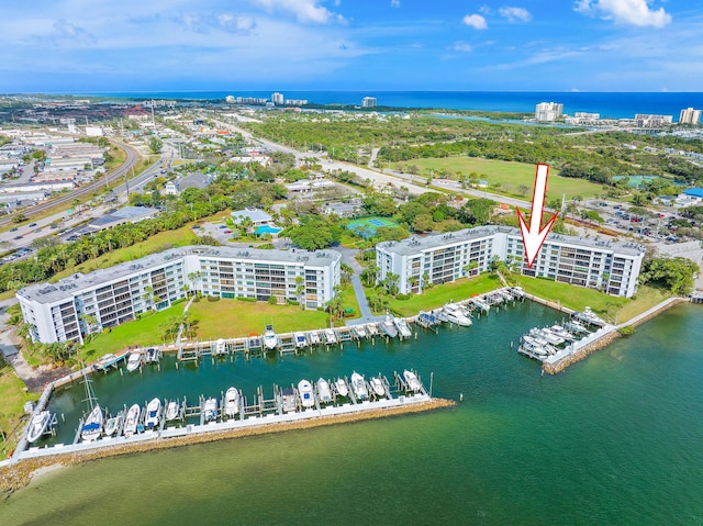 birds eye view of property featuring a water view