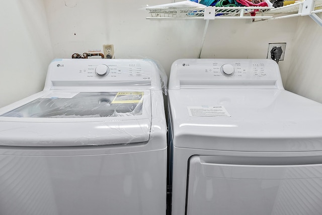 washroom featuring separate washer and dryer