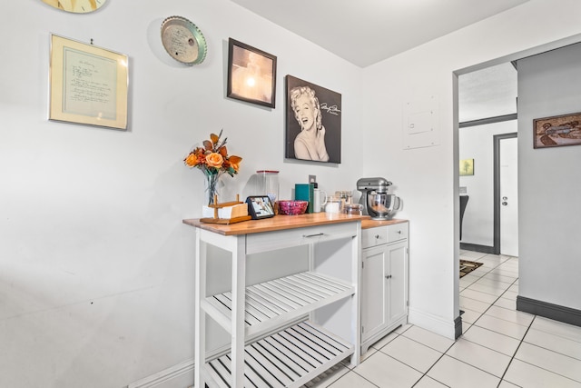 interior space featuring light tile patterned floors