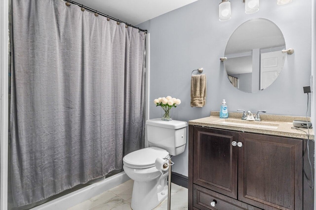 bathroom with vanity, a shower with shower curtain, and toilet