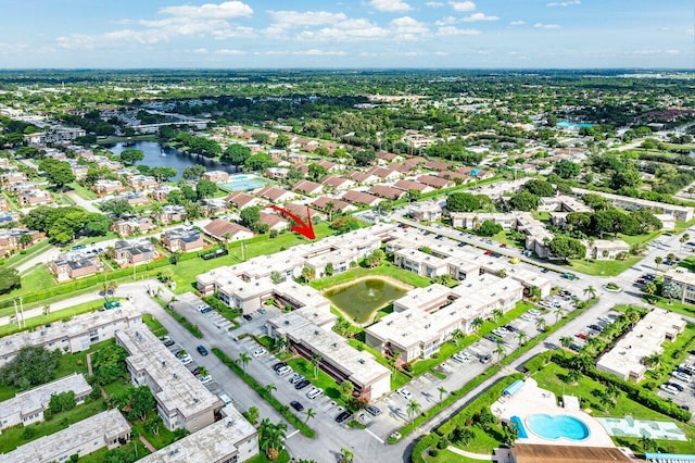 drone / aerial view with a water view