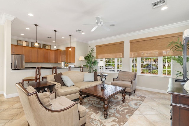 tiled living room featuring ornamental molding and ceiling fan