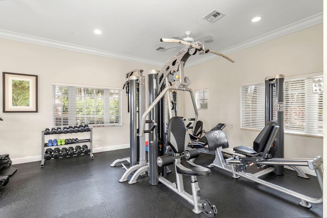 exercise room featuring ceiling fan and ornamental molding